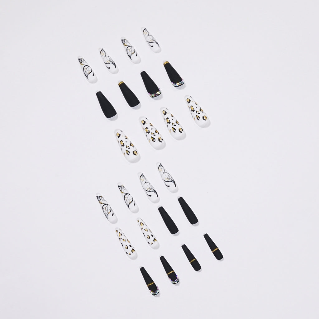 Exfoliating manicure with nail patch and leopard print butterfly stencil