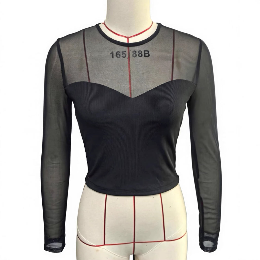 Chic long-sleeved crop top for women with mesh inserts, ideal for spring and summer. A versatile, sexy, and casual crop top for girls.