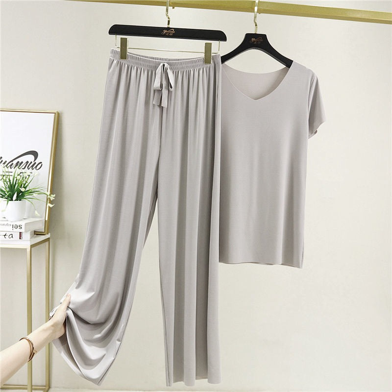 Ensemble deux pièces d'été léger et doux pour femme, composé d'un t-shirt décontracté à manches courtes en soie glacée et d'un pantalon long tendance.