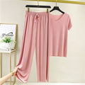 Ensemble deux pièces d'été léger et doux pour femme, composé d'un t-shirt décontracté à manches courtes en soie glacée et d'un pantalon long tendance.