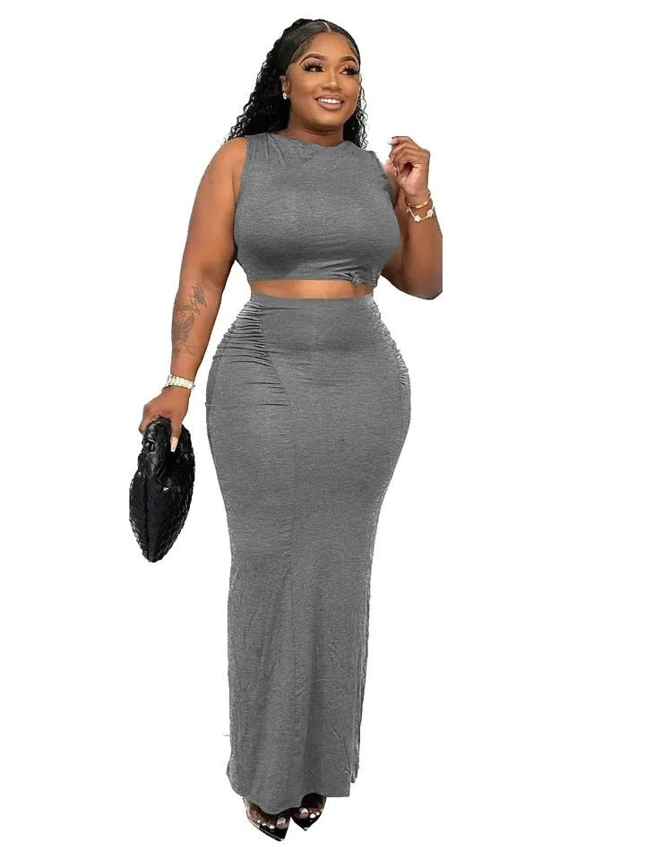 Ensemble deux pièces pour femme : jupe moulante sexy et top long sans manches, couleur unie simple, idéal pour l'été.