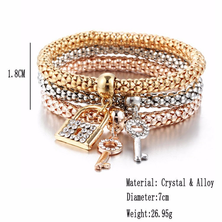14.05 USD - European and American alloy elastic bracelet, adorned with crystals and diamonds, with a key clasp. Trendy and creative hand jewelry.