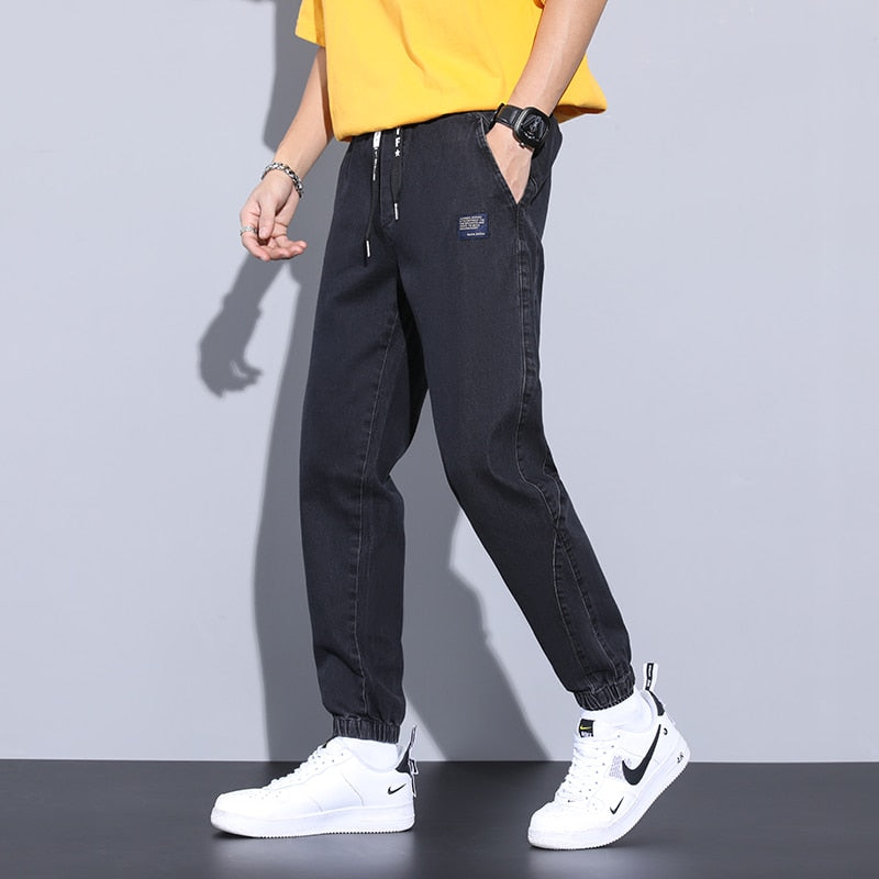 44.24 USD Jean cargo/jogging Harlan gris, coupe ample, broderie texte, taille élastique, collection printemps-été. Tailles M à 8XL.