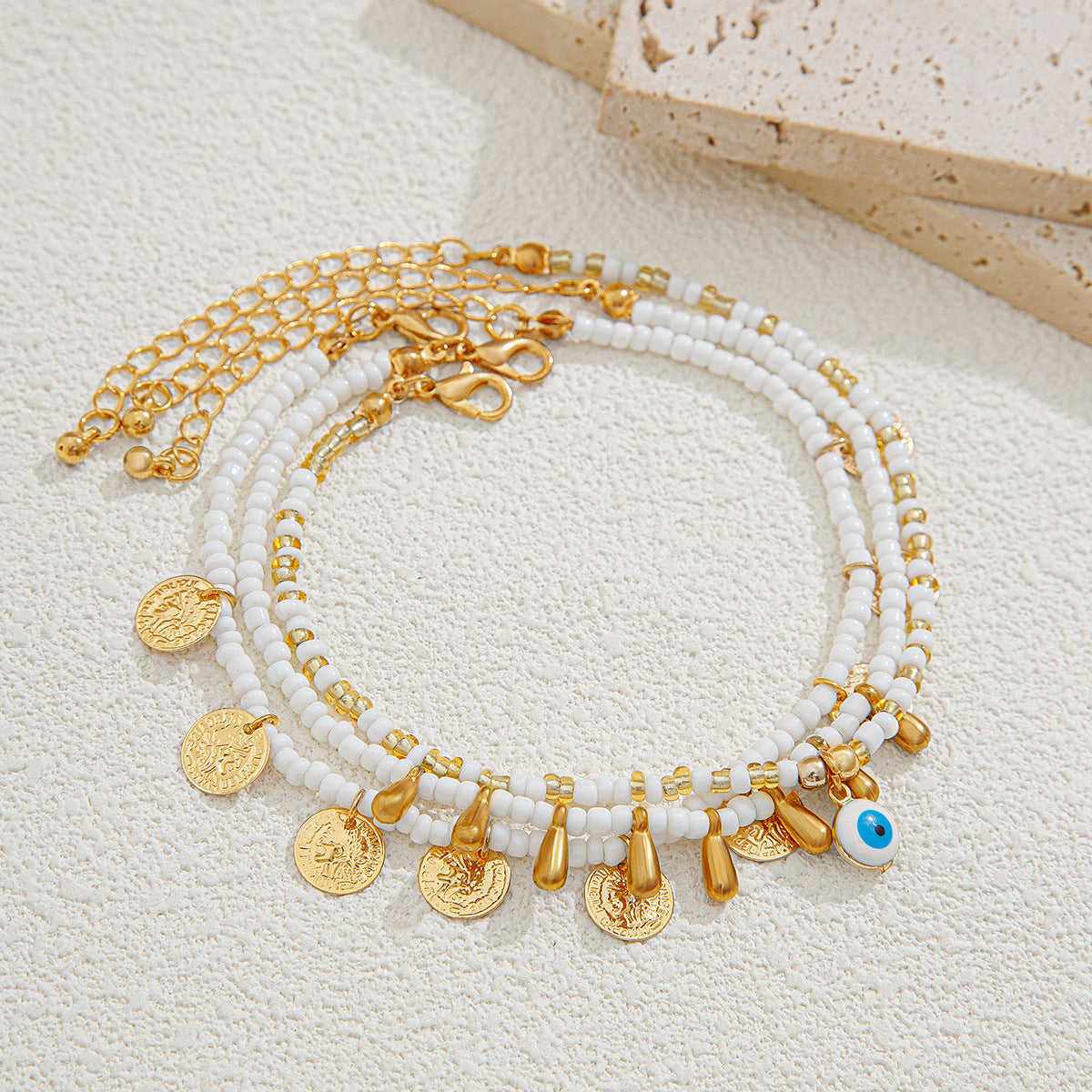 Ensemble de 3 bracelets de cheville style plage décontracté (perles de riz rondes et chaînette en acrylique avec pendentifs goutte d'eau et pièce)