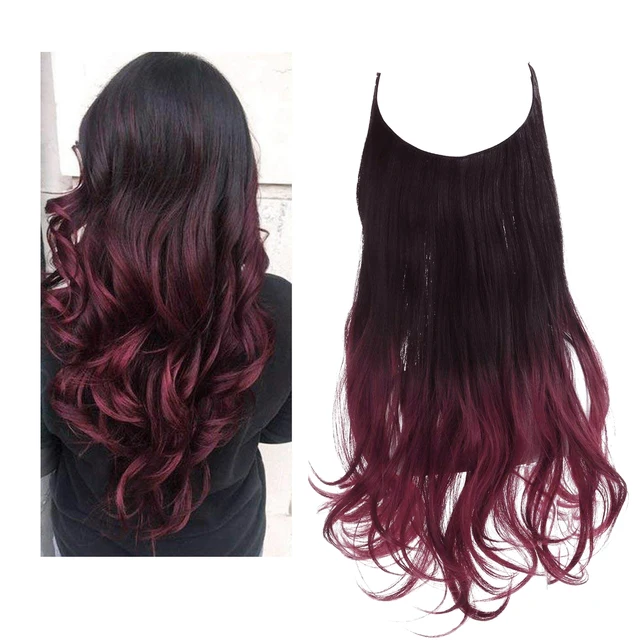 Extension capillaire monobloc pour femme offrant un volume généreux ; modèle en forme de U avec fil invisible, pour une chevelure longue, bouclée et naturelle.