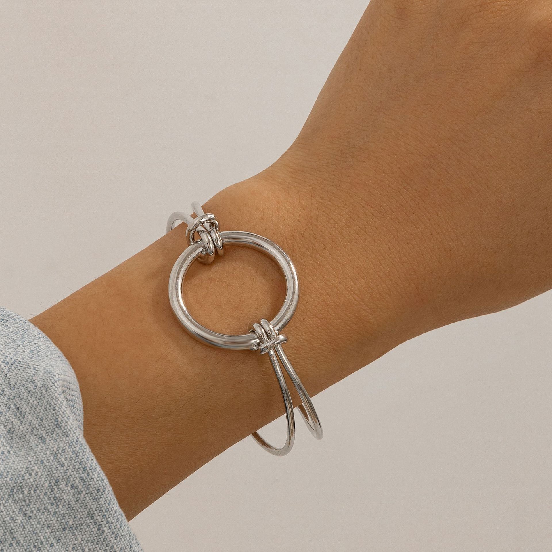 $7.22 USD - Double-row bracelet with hollow knot opening, trendy handmade accessory, ideal for women's daily wear.