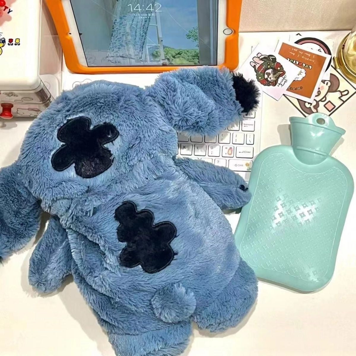 11.64/23.29 USD - Animated celebrity-inspired plush hot water bottle