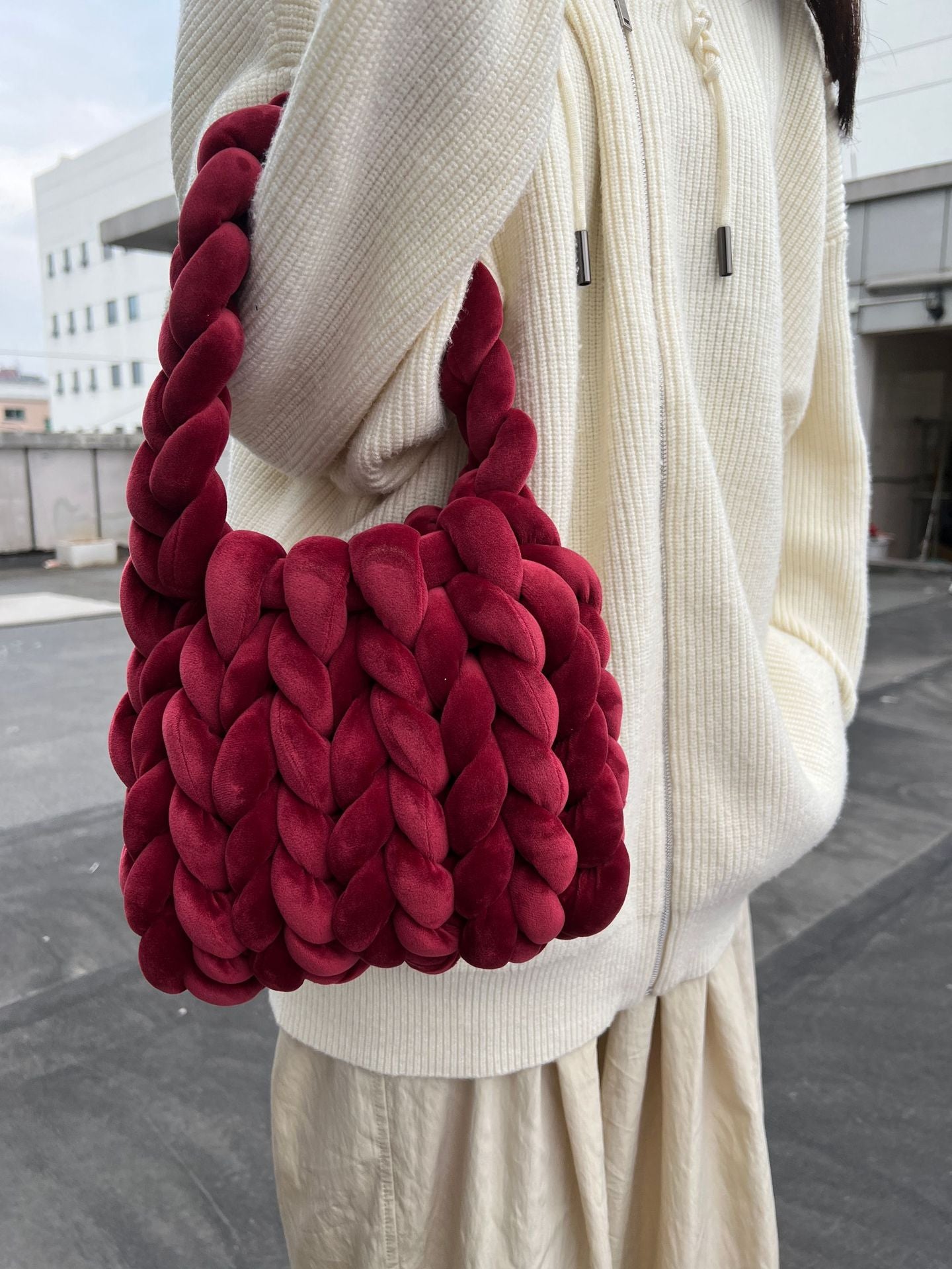 19.80 USD - Hand-woven messenger bag with a crystal velvet core.
