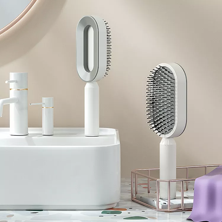 Peigne à coussin d'air amélioré avec système de pression pour un nettoyage facile, idéal pour les cheveux longs des femmes. Peigne de massage avec coussin d'air.