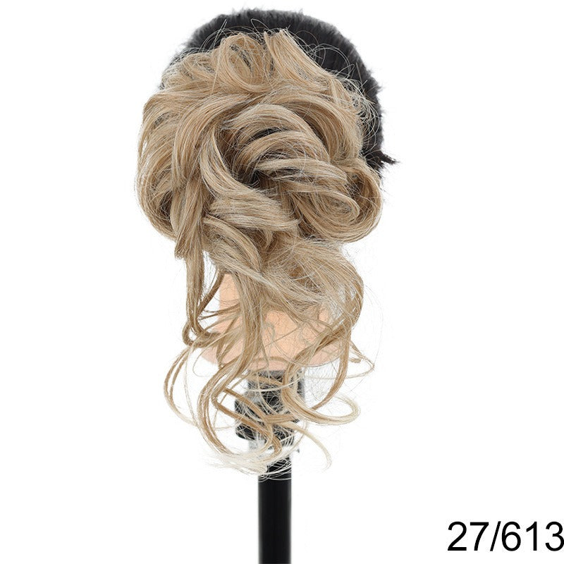Chignon synthétique bouclé et ébouriffé sur pince (type « claw clip ») avec mèches pendantes – Postiche pour femme