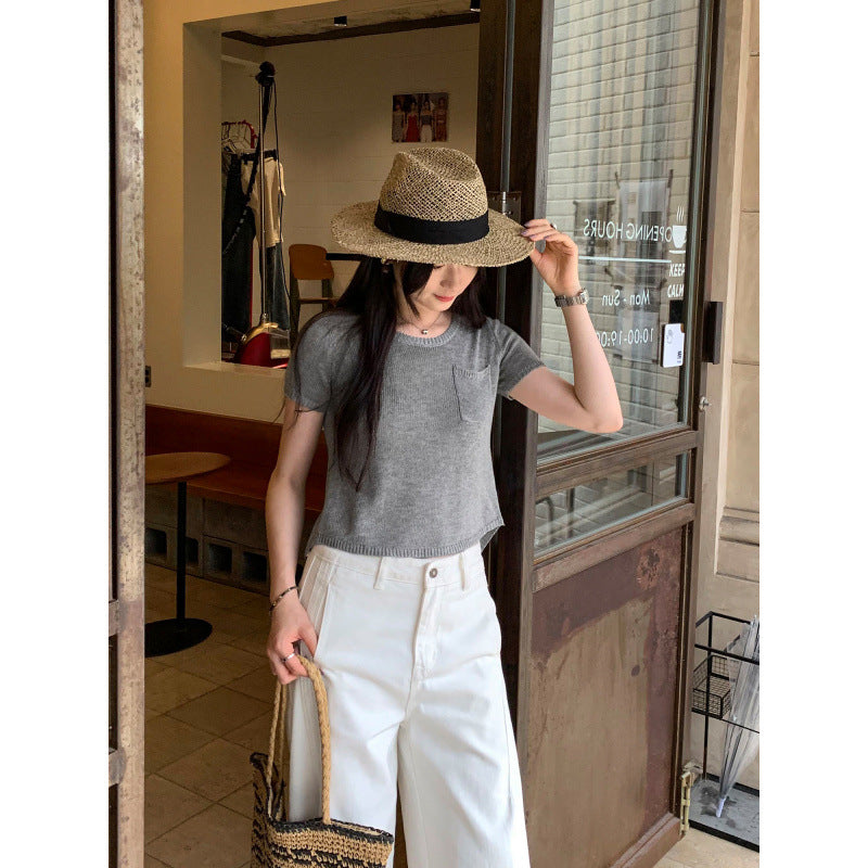 24,45 USD - T-shirt unis avec poche a manche courte