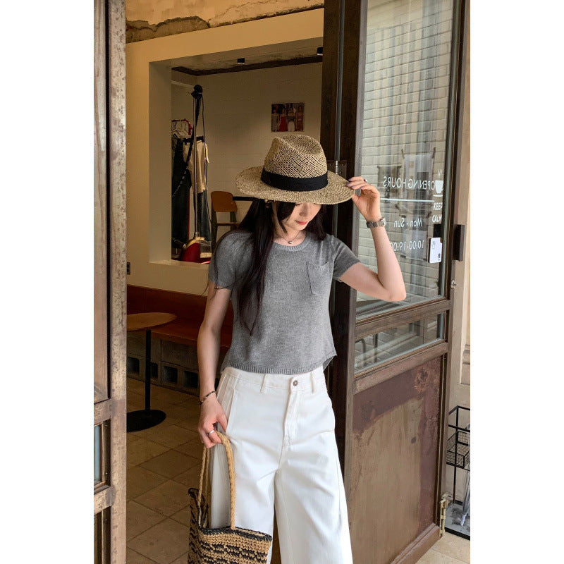 24,45 USD - T-shirt unis avec poche a manche courte