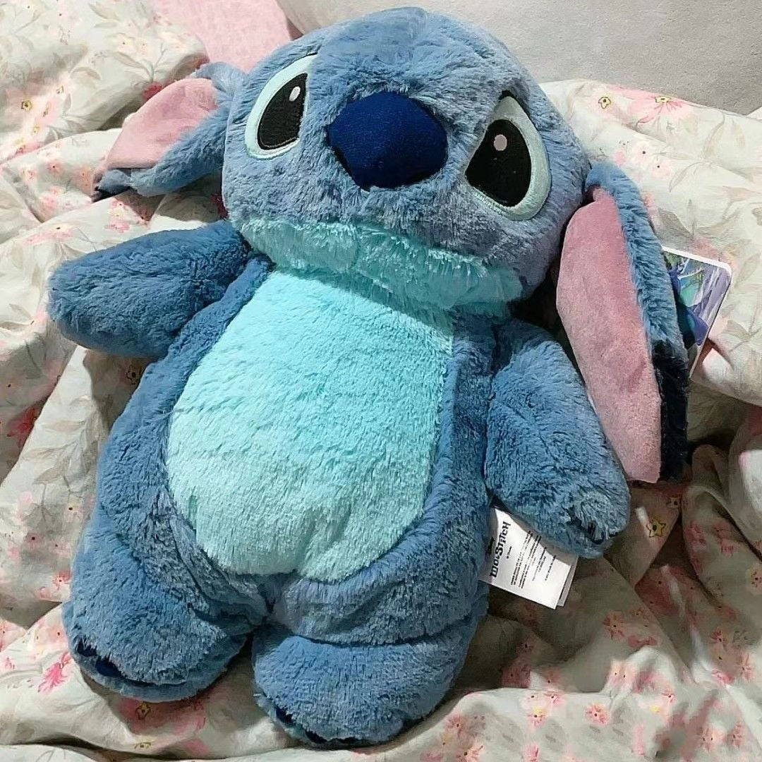 11.64/23.29 USD - Animated celebrity-inspired plush hot water bottle