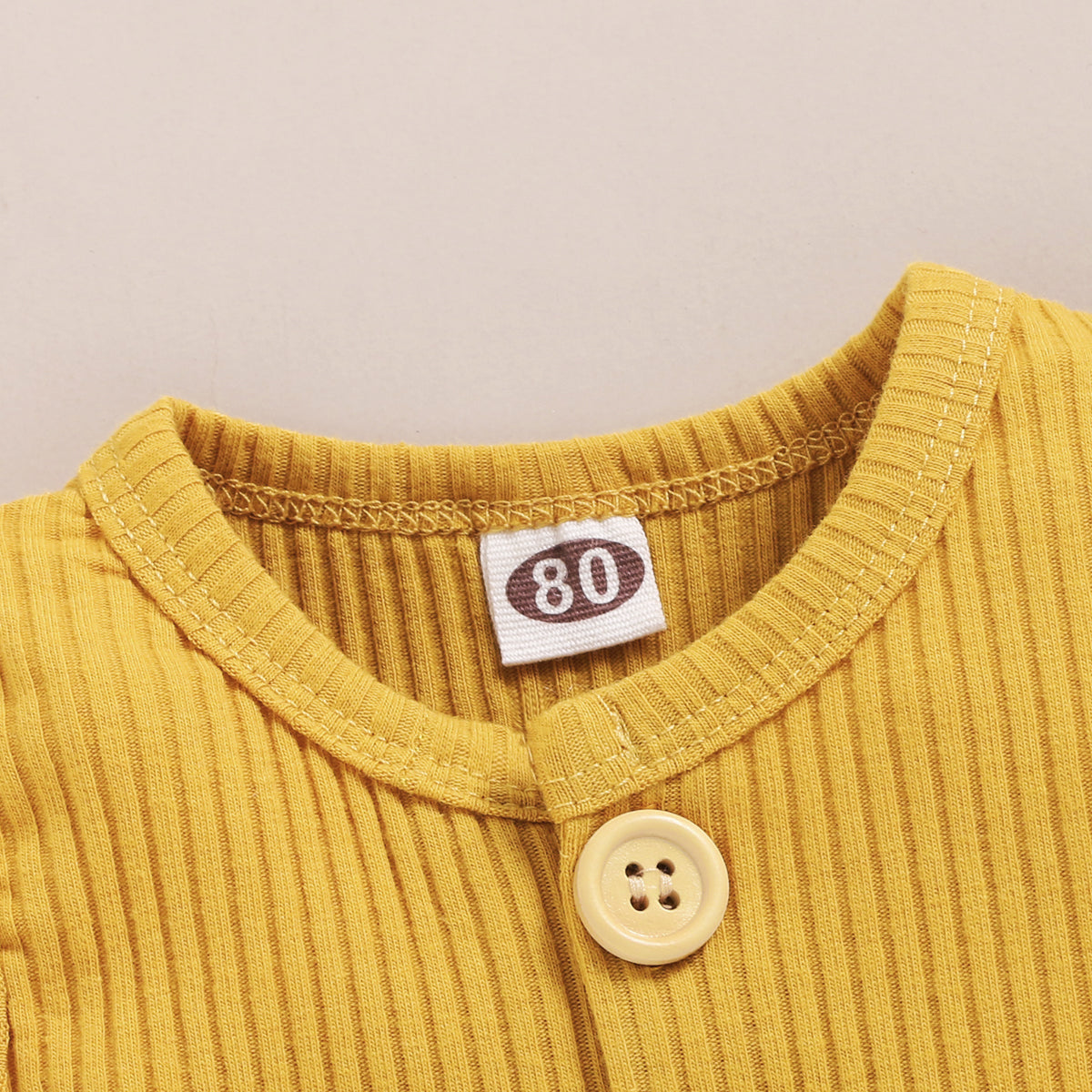 15.13 USD Ensemble de vêtements pour bébés garçons et filles, débardeur sans manches à boutons et short assortis.