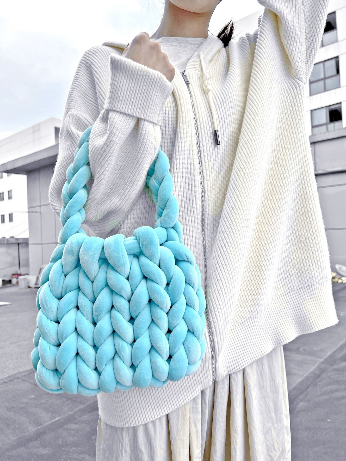 19.80 USD - Hand-woven messenger bag with a crystal velvet core.