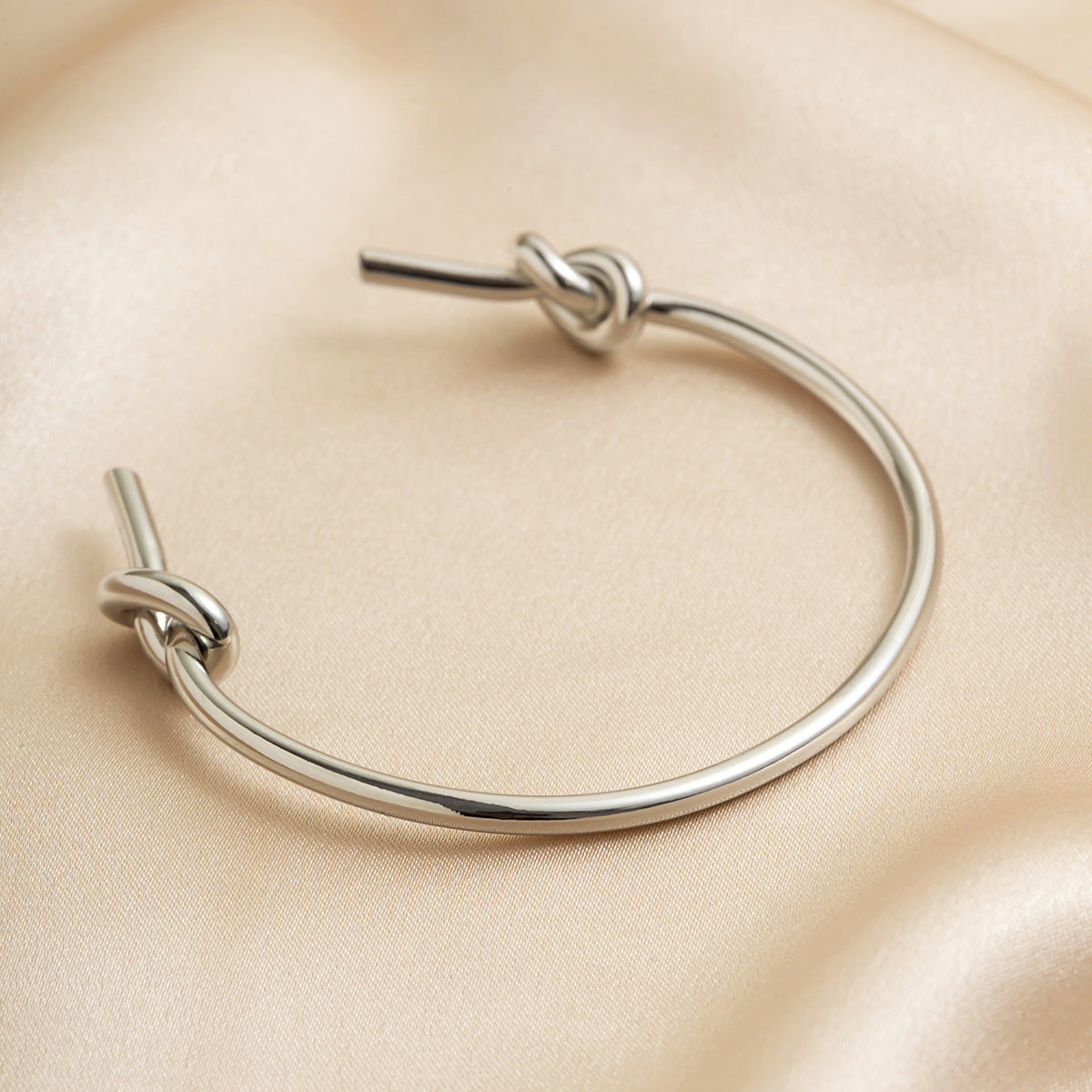 $7.22 USD - Double-row bracelet with hollow knot opening, trendy handmade accessory, ideal for women's daily wear.