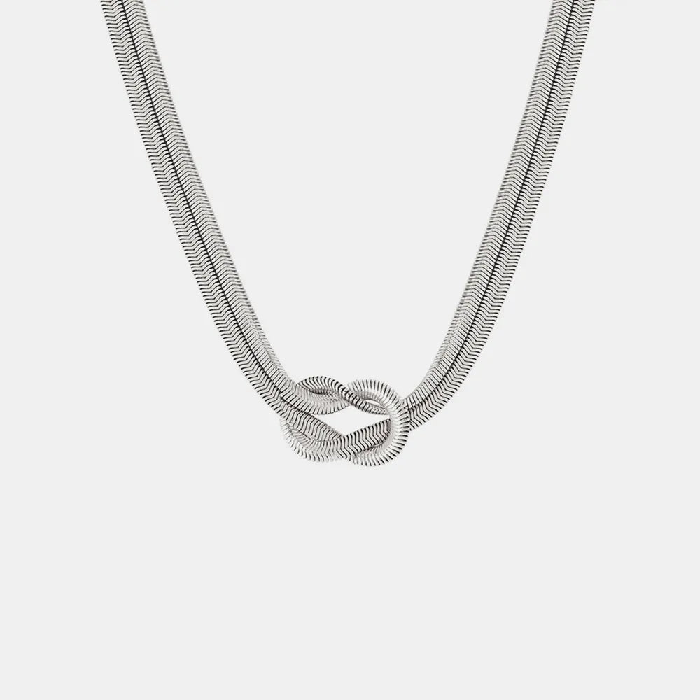 17,70 USD - Collier nœud en acier titane