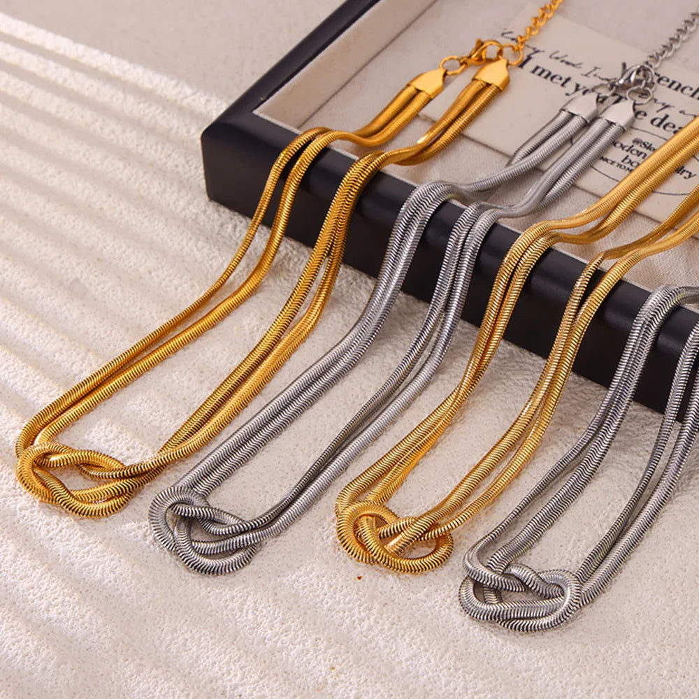 17,70 USD - Collier nœud en acier titane