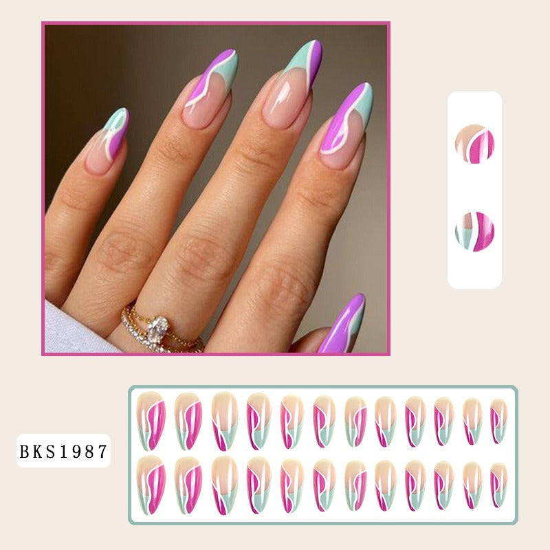 Almond manicure, natural look, trendy style, medium-length nails, patch effect.