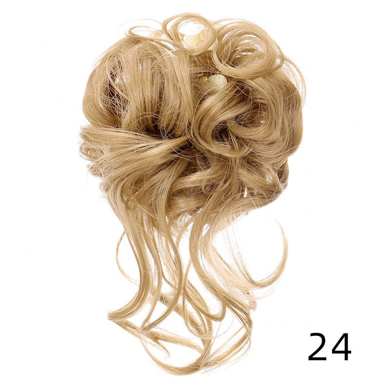 Chignon synthétique bouclé et ébouriffé sur pince (type « claw clip ») avec mèches pendantes – Postiche pour femme