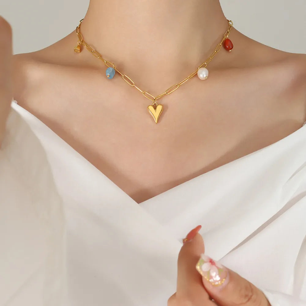16,88 USD - Collier pendentif cœur en acier titane