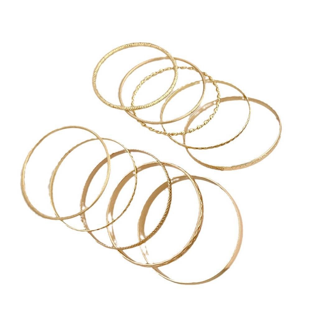 11,64 USD - Bracelets très populaires, ensemble de dix bracelets bohèmes tendance et originaux, style feng shui, à effet ondulé et brillant.
