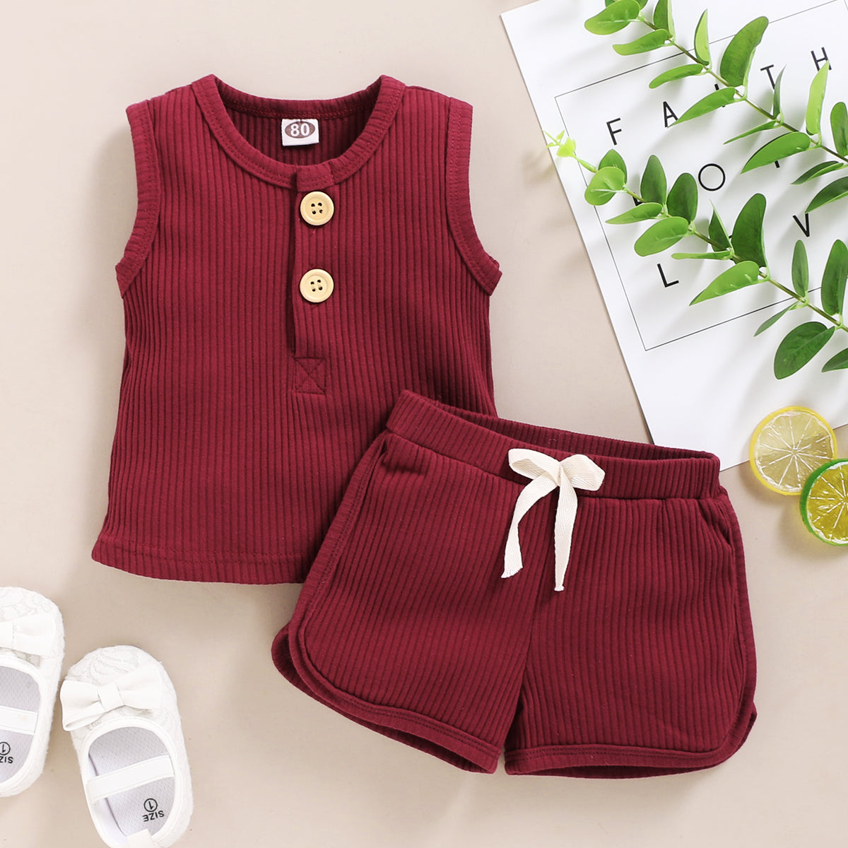 15.13 USD Ensemble de vêtements pour bébés garçons et filles, débardeur sans manches à boutons et short assortis.