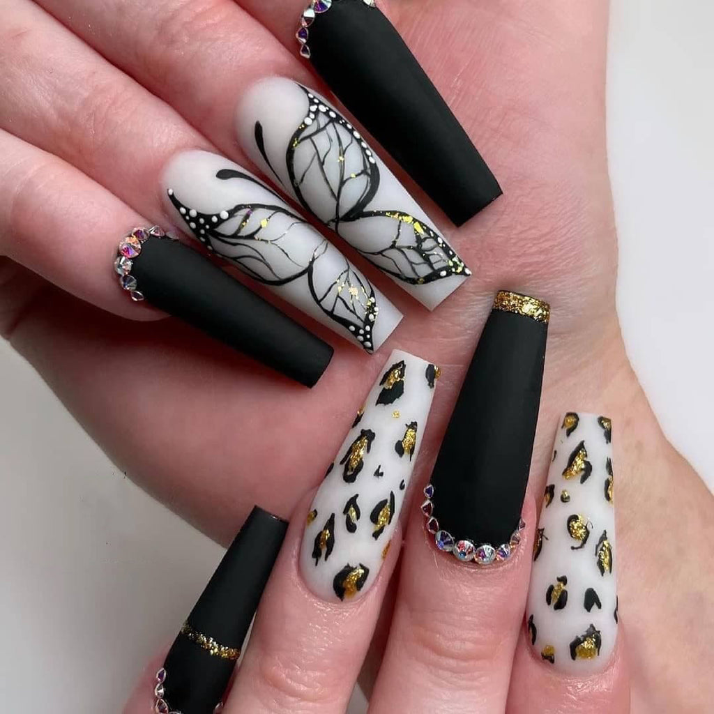 Exfoliating manicure with nail patch and leopard print butterfly stencil