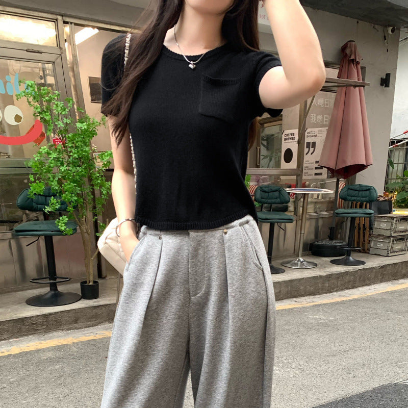 24,45 USD - T-shirt unis avec poche a manche courte