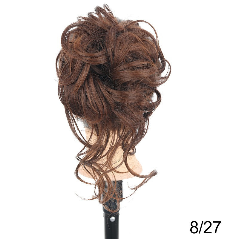 Chignon synthétique bouclé et ébouriffé sur pince (type « claw clip ») avec mèches pendantes – Postiche pour femme