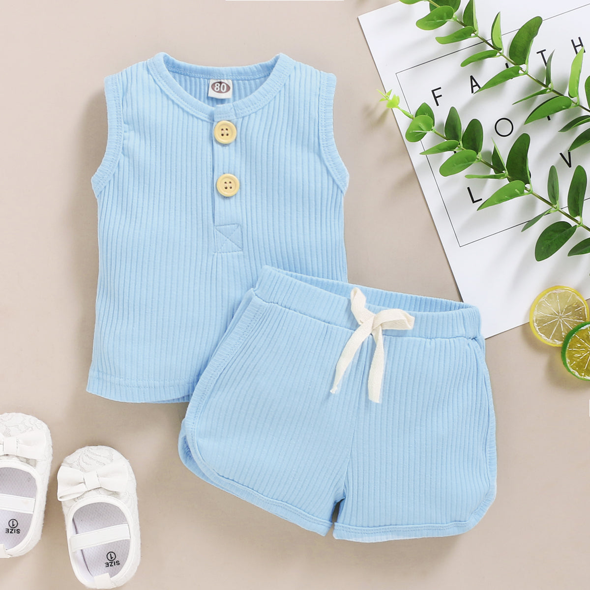 15.13 USD Ensemble de vêtements pour bébés garçons et filles, débardeur sans manches à boutons et short assortis.