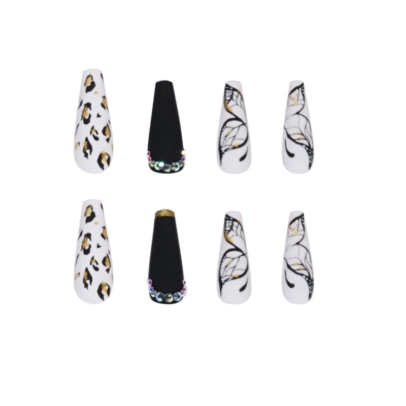 Exfoliating manicure with nail patch and leopard print butterfly stencil