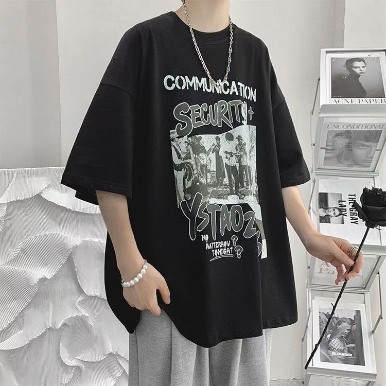Loose-fit mid-length sleeve T-shirt