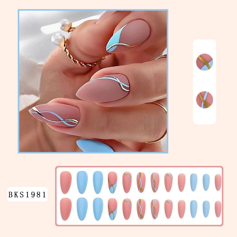 Almond manicure, natural look, trendy style, medium-length nails, patch effect.