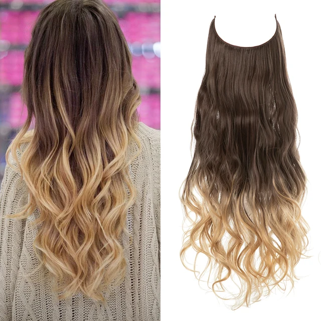Extension capillaire monobloc pour femme offrant un volume généreux ; modèle en forme de U avec fil invisible, pour une chevelure longue, bouclée et naturelle.