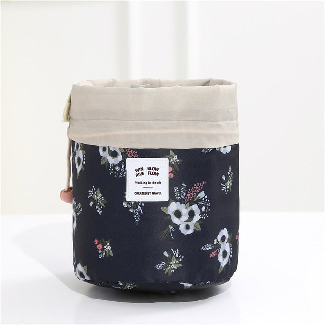 $13.97 - Women's Round Makeup Bag, Ideal for Travel, with Compartments for Toiletries.