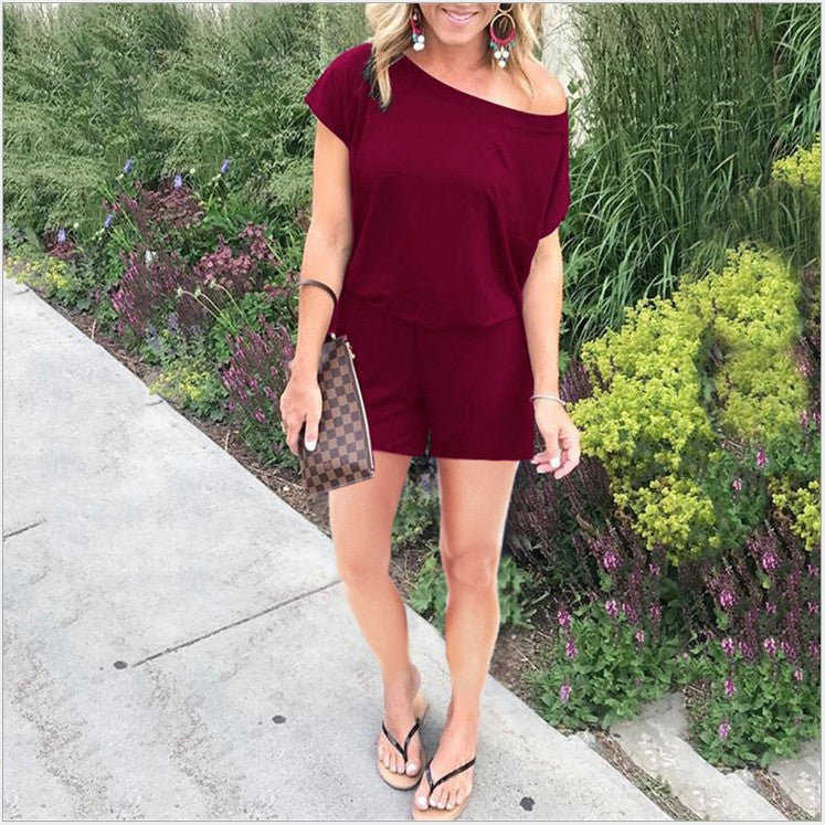 Combinaison femme tendance à épaules asymétriques, manches courtes et poches, disponible en 6 couleurs