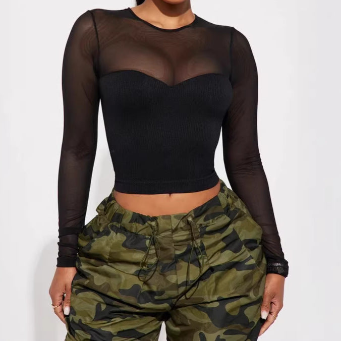 Chic long-sleeved crop top for women with mesh inserts, ideal for spring and summer. A versatile, sexy, and casual crop top for girls.
