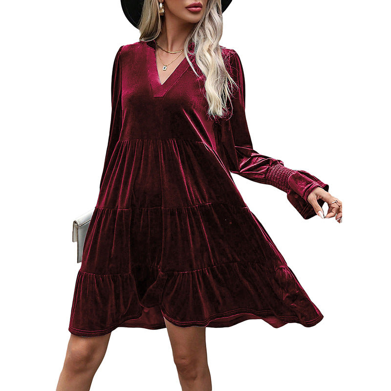Robe de soirée à manches longues et empiècements en velours