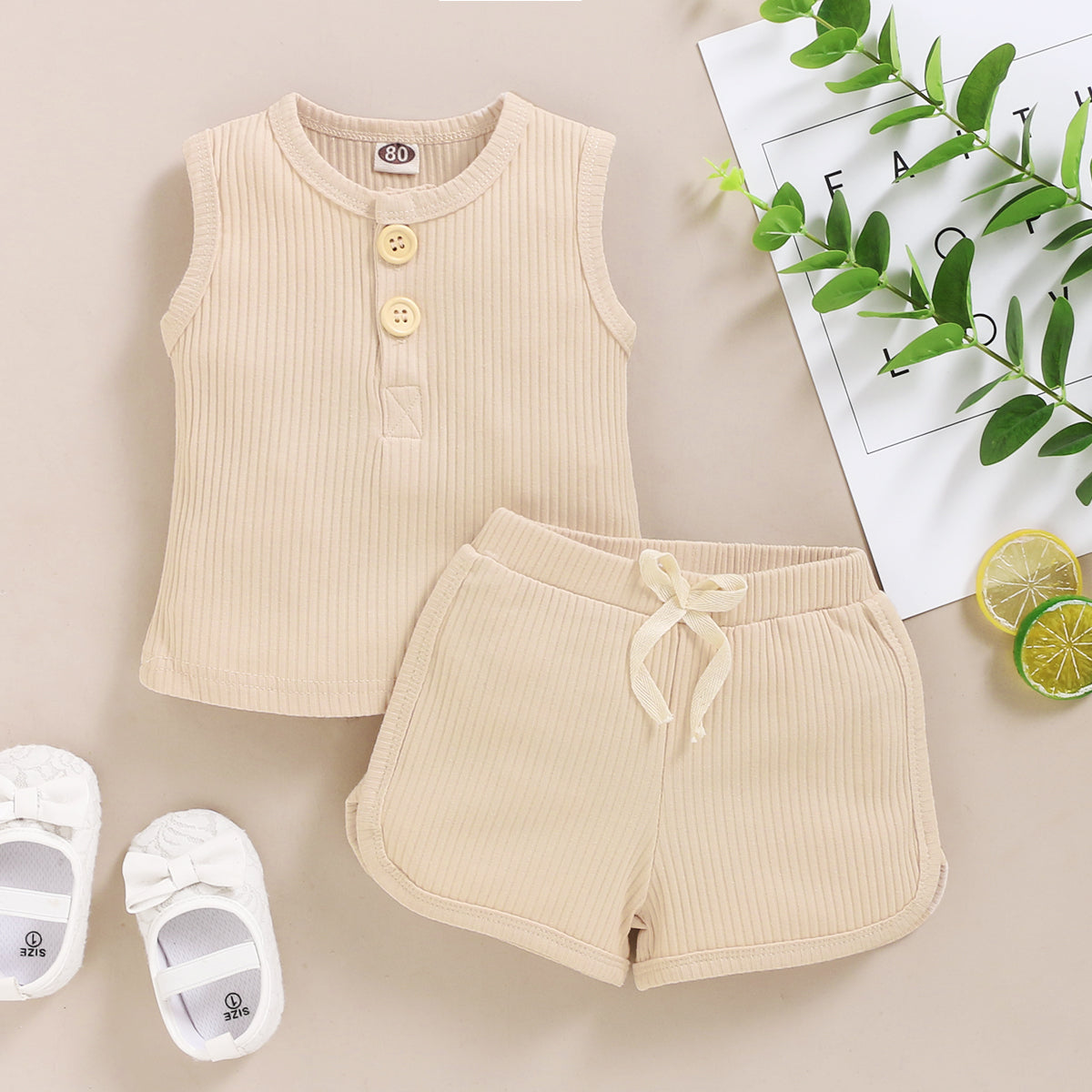 15.13 USD Ensemble de vêtements pour bébés garçons et filles, débardeur sans manches à boutons et short assortis.