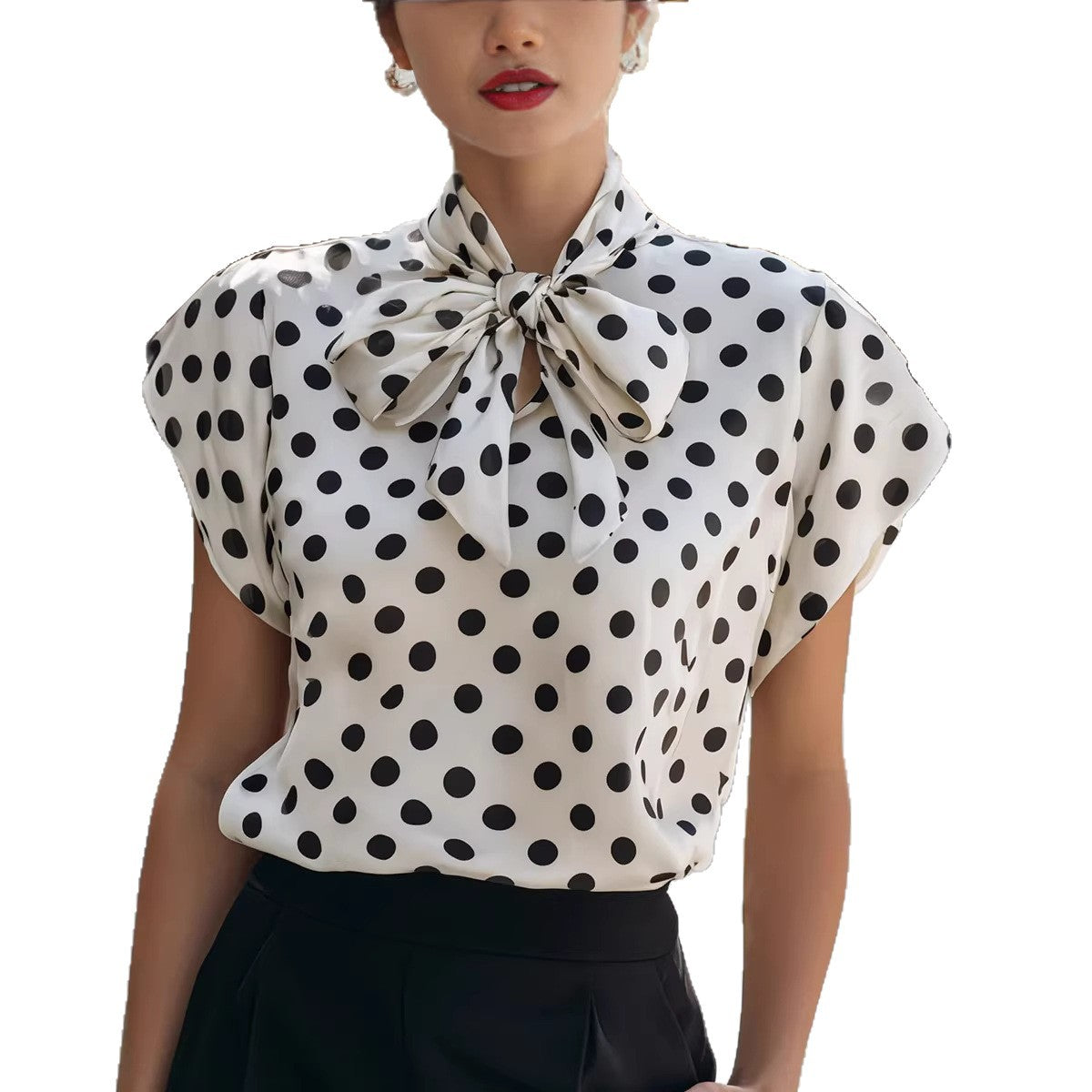 Polka dot top with a bow collar and short sleeves