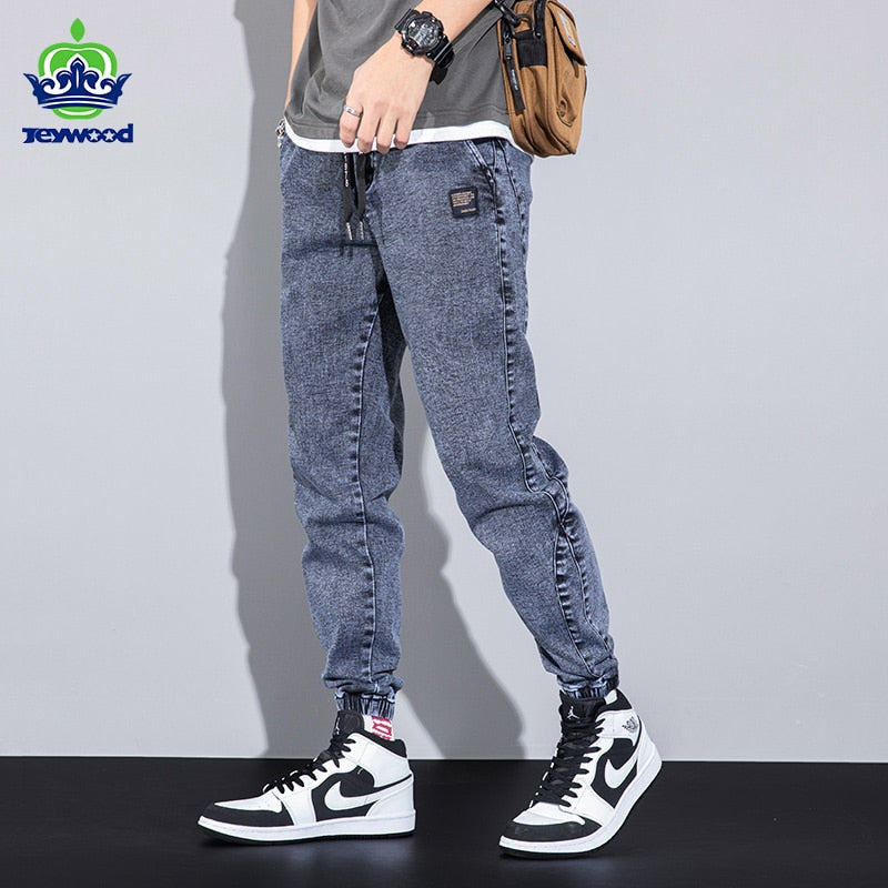 44.24 USD Jean cargo/jogging Harlan gris, coupe ample, broderie texte, taille élastique, collection printemps-été. Tailles M à 8XL.