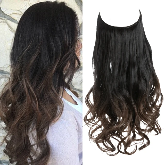 Extension capillaire monobloc pour femme offrant un volume généreux ; modèle en forme de U avec fil invisible, pour une chevelure longue, bouclée et naturelle.