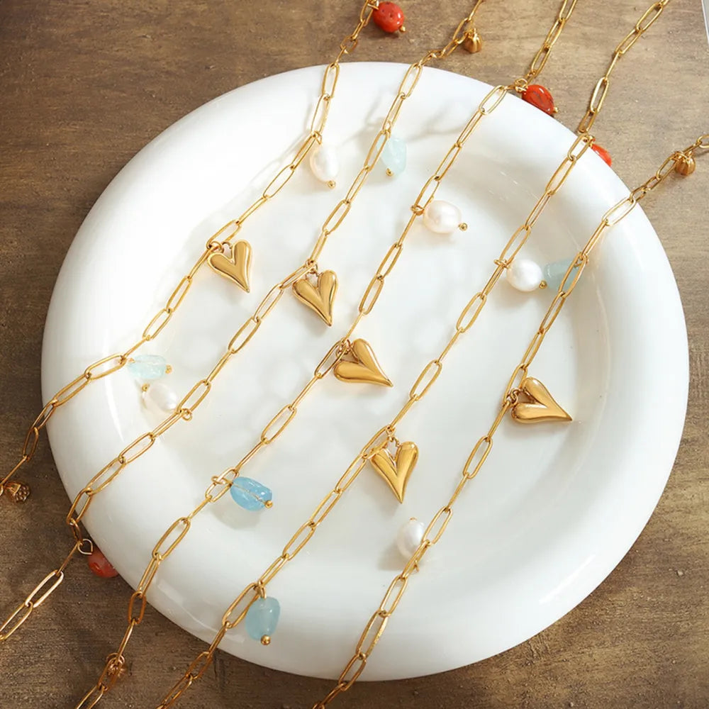 16,88 USD - Collier pendentif cœur en acier titane