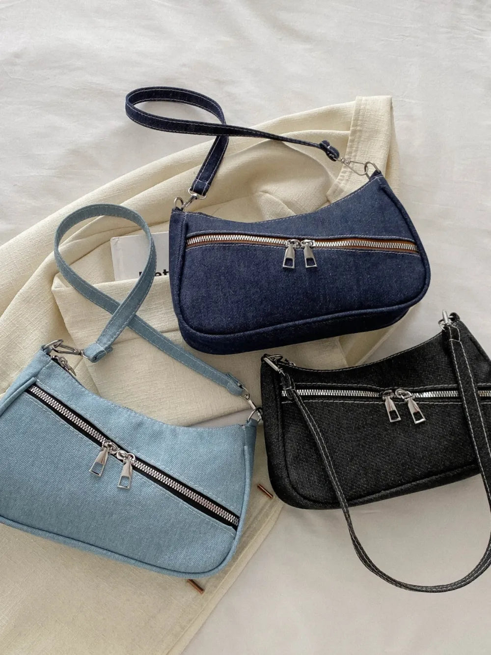 Denim crossbody bag with zipper closure