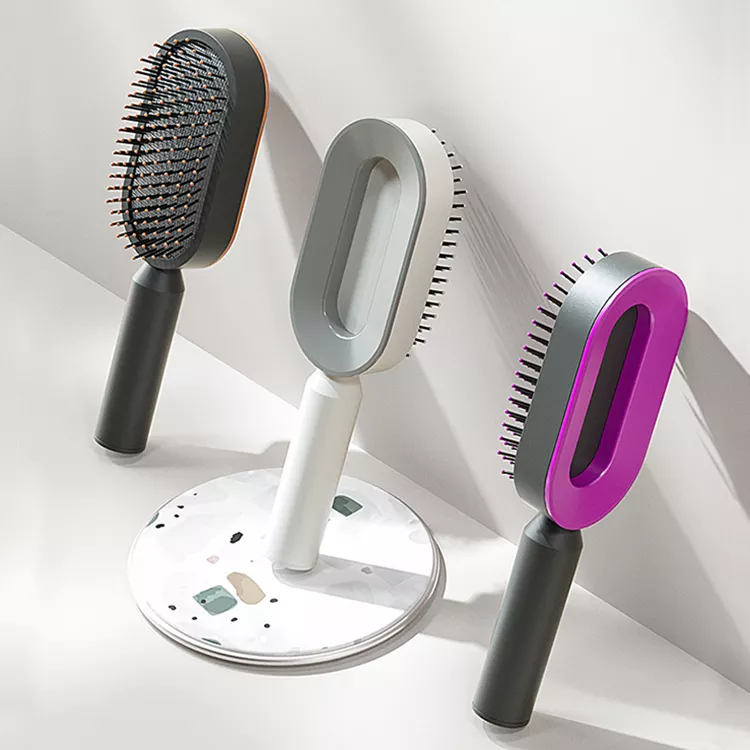 Peigne à coussin d'air amélioré avec système de pression pour un nettoyage facile, idéal pour les cheveux longs des femmes. Peigne de massage avec coussin d'air.