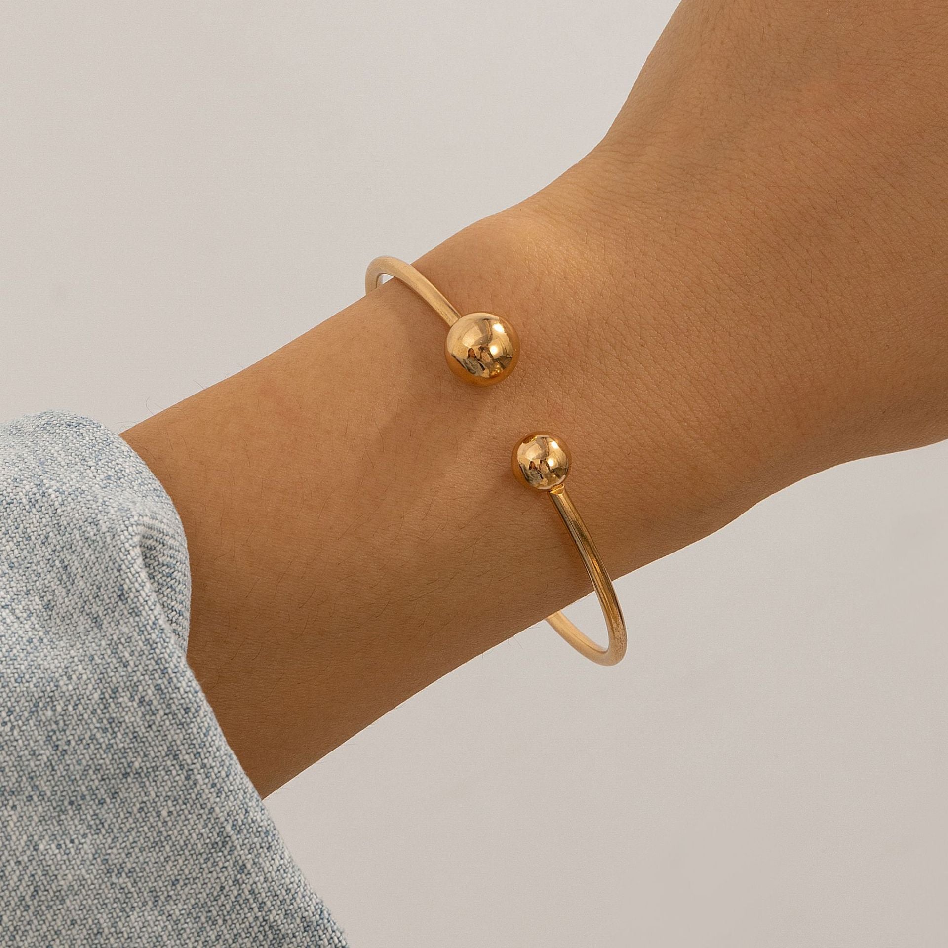 $7.22 USD - Double-row bracelet with hollow knot opening, trendy handmade accessory, ideal for women's daily wear.