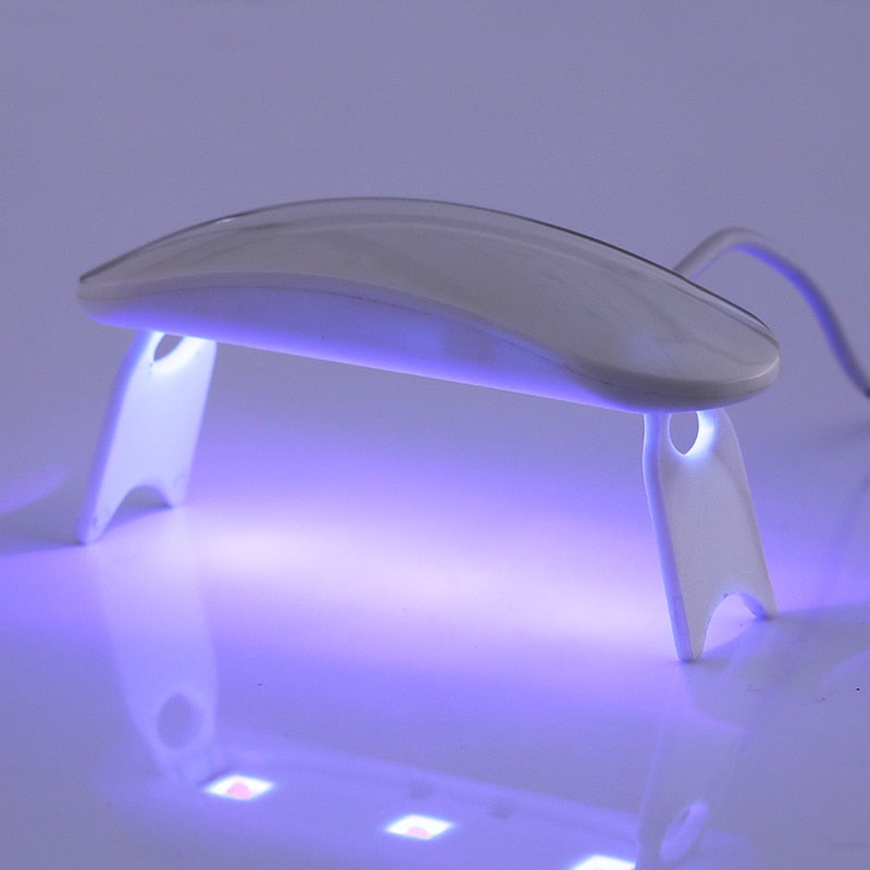 13.97 USD Sèche-ongles UV LED 6W blanc, portable, avec câble micro USB, pour une utilisation à domicile. Séchoir à vernis gel UV, 3 LED, outils de nail art.