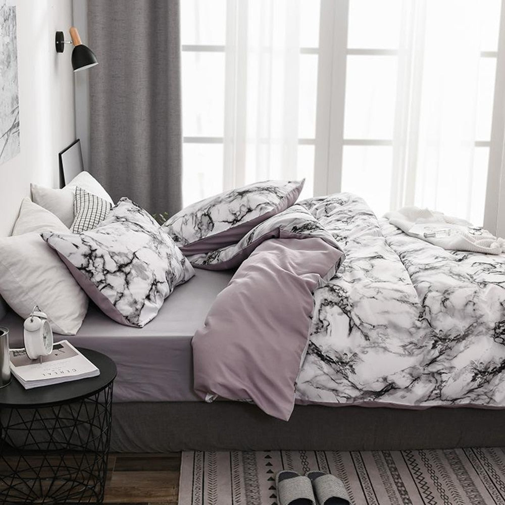 15.13/41.91 USD  La parure de lit est composée d'une housse de couette imprimée à motif marbre blanc confortable (ensemble 2/3 pièces).