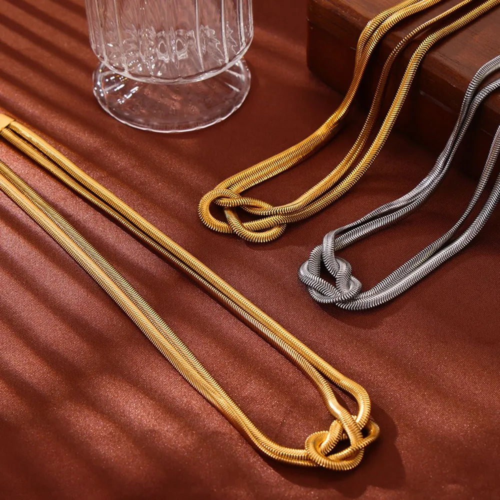 17,70 USD - Collier nœud en acier titane